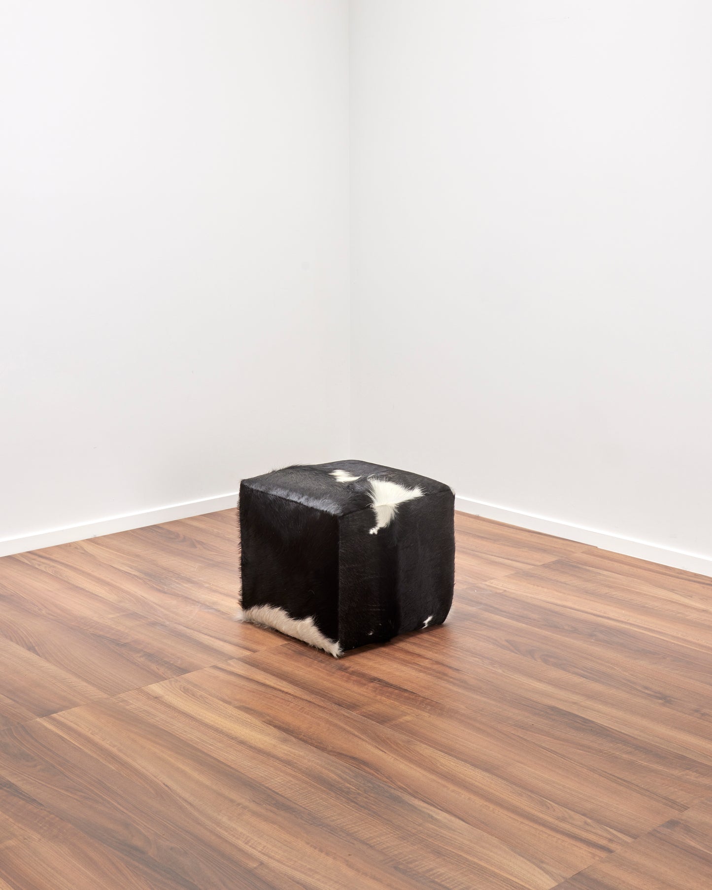 Elfin Cowhide Ottoman